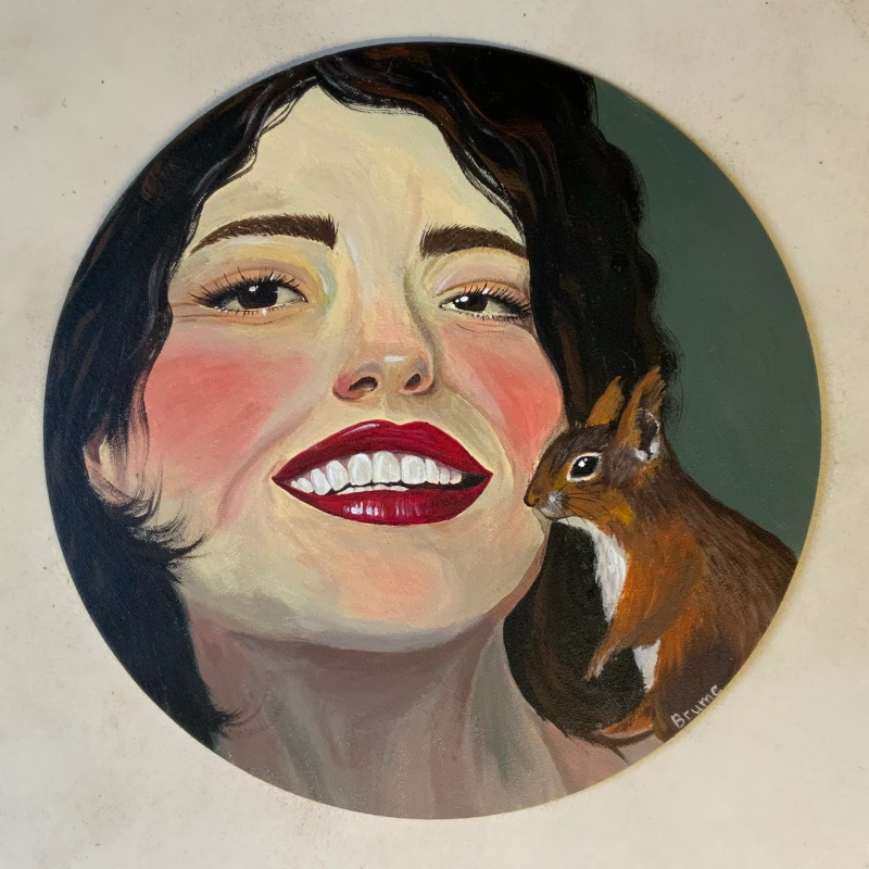 Photo d'une acrylique réprésentant un écureuil et une femme