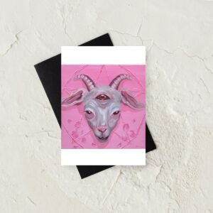 Portrait de biquette sur fond rose